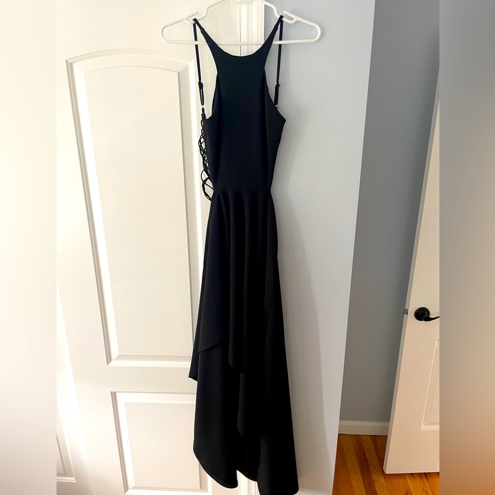 Black gown from hello molly, open back with straps. Very sexy worn once.